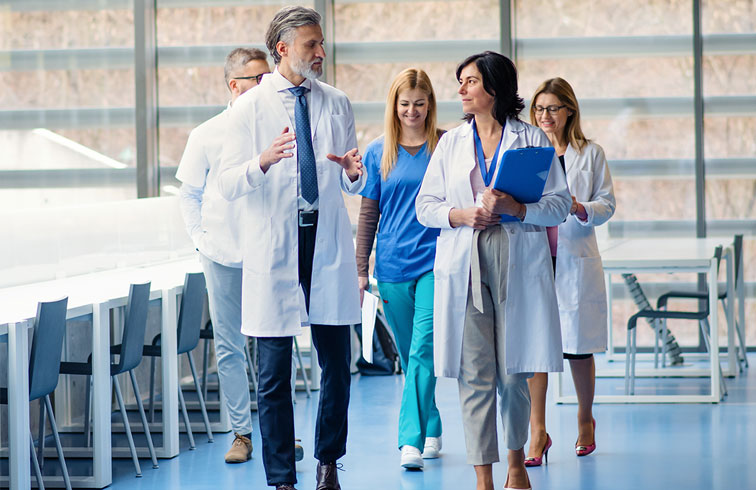 Doctors and nurses walking